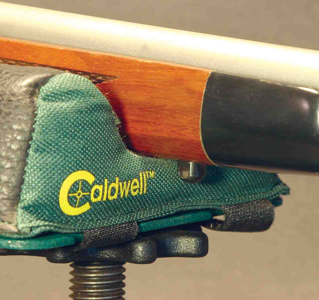Place a rifle’s forend on a padded rest with the sling-swivel stud close to the sandbag, and the stud can bump the rest during recoil, causing a flyer.